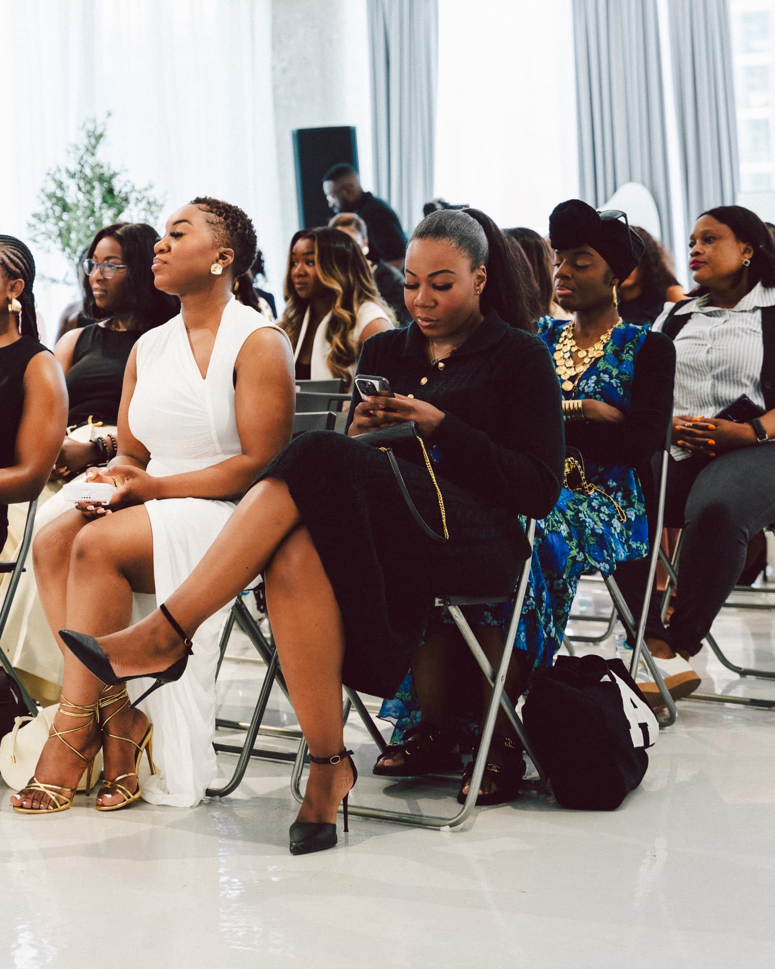 Attendees seated and engaged during a keynote session